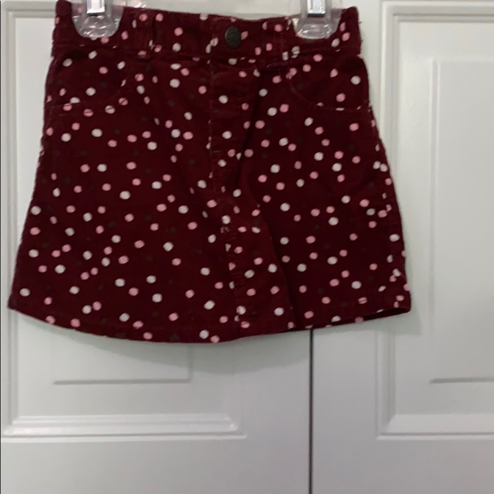 Maroon with polka dot skirt